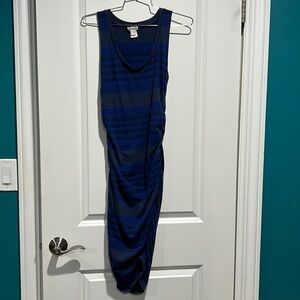 Converse one star.  Dress with ruching on each side. Size medium.